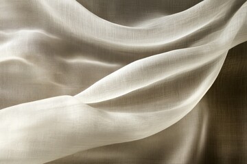 Delicate, flowing fabric draped in soft, muted tones.