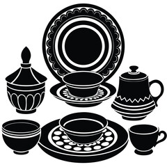 Black and white vintage ceramic dishes, cups, plates, and bowls set with floral and ornamental decorative patterns