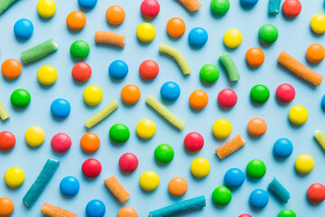 colorful candies as background top view. Seamless pattern with candy. Many sweet candies close-up