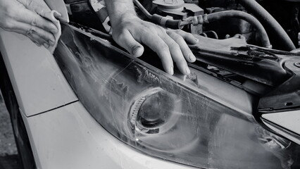 Car Maintenance Process Detailed Close-Up Monochrome Hands Cleaning Concept