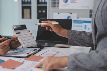 Accounting company provide finance and taxation planning for profitable cash flow, Auditor and accountant team working in office, analyze financial data and accounting record with calculator.Insight