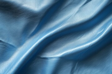 Obraz premium Close-up view of elegant light blue fabric folds.