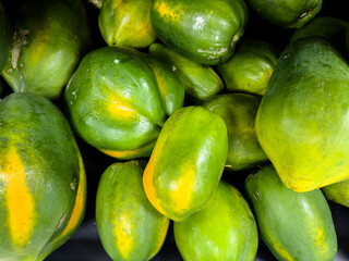Pile of Green Papayas Close Up Still Life
