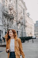 Young traveler embracing slow urban exploration on a peaceful city street. Mindful tourism, local culture, and relaxed digital lifestyle...