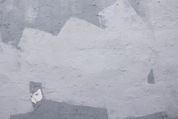 Textured gray background with geometric white shapes. Rough, minimal style, suitable for contemporary design. Texture, background, abstract, modern 90s aesthetic.