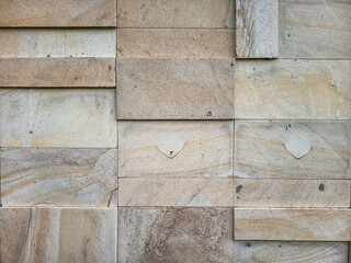 Rectangular natural rock wall tile texture for 3D rendering material and background.