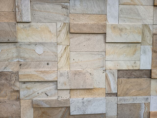 Rectangular natural rock wall tile texture for 3D rendering material and background.