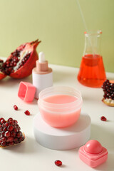 Self care and skincare products concept - pomegranate cosmetics