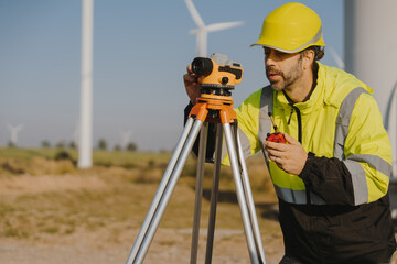 Engineers inspect wind farms, power generation systems, natural industries and environmental concepts, clean energy.