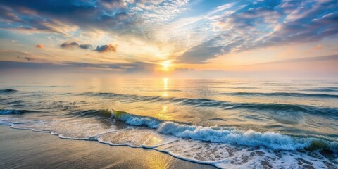 Obraz premium Calm ocean at sunrise with gentle waves and misty atmosphere, serene and peaceful, grey sky, calm ocean, grey sky