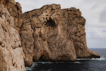 Steep cliff in mediterranean island. Sardinian orography.