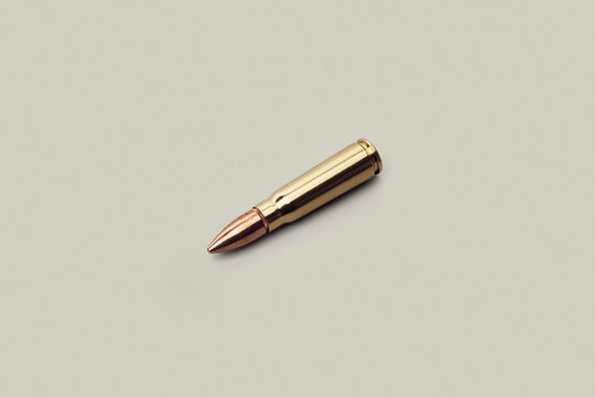 Studio shot 7.63 x 39mm bullet used with AK-47 on white background
