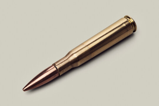 Studio shot of .50 BMG bullet on white background
