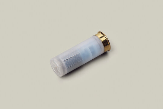 12/70 shotgun shell on white background
