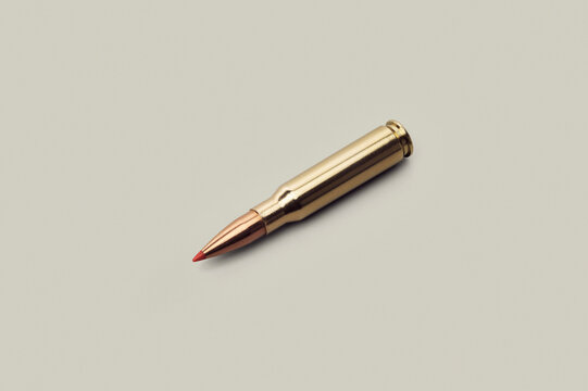 Still life .308 bullet cartridge on white background
