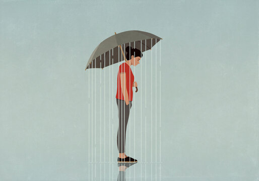 Rain falling from umbrella over depressed woman
