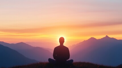Man meditates at peaceful sunset
