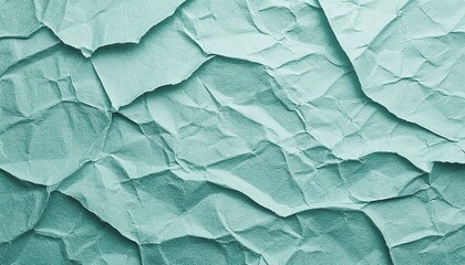 Fototapeta premium Wrinkled cyan-colored paper background texture