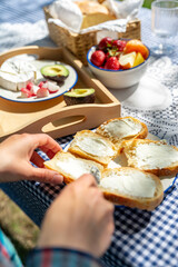 female hands making sandwich