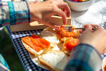 female hands making sandwich