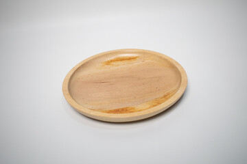 Minimalist wooden serving plate, ideal for rustic or eco-friendly dining settings.