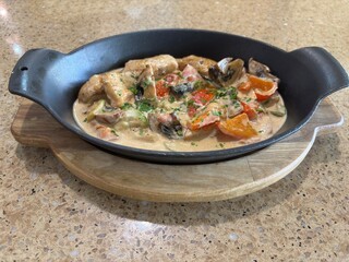 Creamy Chicken and Vegetable Skillet in Rustic Cast Iron Pan