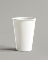 Blank white enamel cup mockup for effective branding on grey backdrop with realistic shadows
