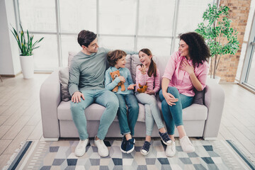 Happy family spending quality time together indoors on a cozy day in a modern apartment, enjoying love and bonding moments