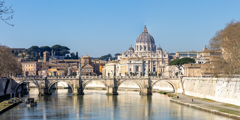 Rome skyline with St. Peter's Basilica in Vatican panorama Ponte Sant'Angelo bridge over Tiber...