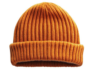 orange knitted beanie hat isolated on white background.
