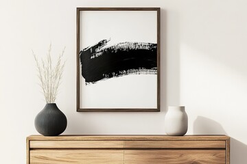 modern interior design ,Minimalist, modern black-and-white brush stroke poster, framed and hung above an empty wooden sideboard adorned with vases and decorations.