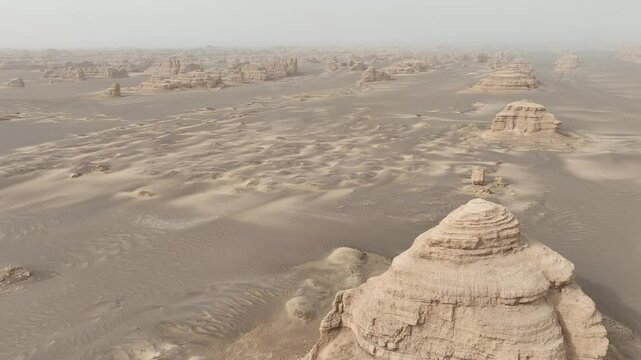Drone view of The Yadan Geo Park with unique rock formations in the Gobi Desert on a sunny day