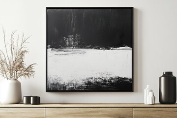 modern interior design ,Minimalist, modern black-and-white brush stroke poster, framed and hung above an empty wooden sideboard adorned with vases and decorations.