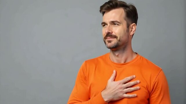 Vow, promise, swear it's true concept, a man with his hand on his heart