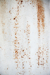 Painted old metal surface with rust appearing. The texture of painted metal.