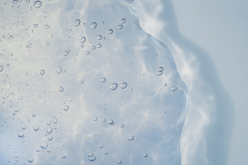 Cosmetic beauty product sample swatch. Liquid gel on a digital screen of microscope or sparking...