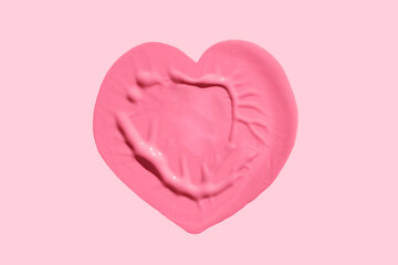 Liquid blush cushion stamp heart-shaped on pink background