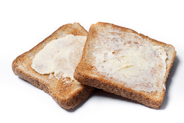 Sliced fresh bread and butter isolated on white background.