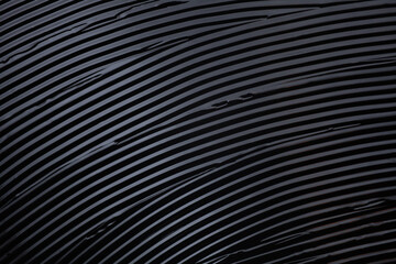 Cosmetic make up product texture. Photo of black liquid creamy mascara for eye lashes or eye liner...