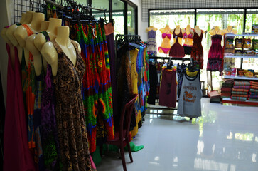 Obraz premium Clothing garment fashion handmade clothes shop for thai people and foreign traveler travel visit shopping and select buy wearing in local convenience store shop on April 23, 2011 in Krabi, Thailand