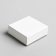 Fototapeta premium Minimalist packaging design mockup: pure white box with thin sans serif typography and natural linen texture, isolated on gray background.