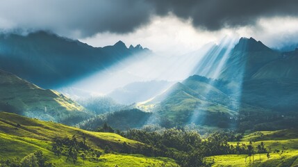Aerial view of mountain range glowing under the light of the rising sun