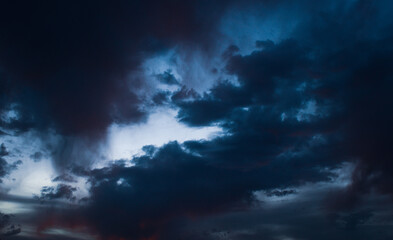 Dark rainy thunderstorm clouds grey color horizontal image