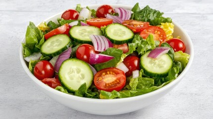 Fresh Garden Salad in Bowl: A vibrant and healthy garden salad in a white bowl, featuring crisp lettuce, juicy cherry tomatoes, refreshing cucumber slices, and thinly sliced red onion.