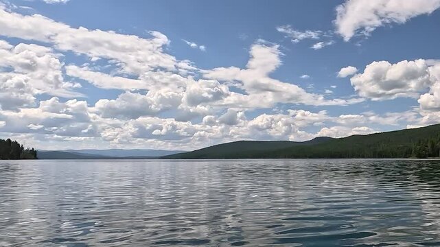 Summer landscape with reflection in water. Russia, Republic of Tuva, Lake Azas