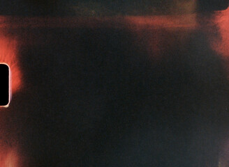 Light leaks and film grain creating abstract background texture