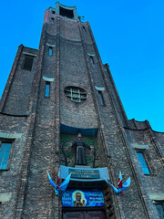 Church, sanctuary of St. Anthony of Padua in Częstochowa, Poland. Front wall, above the main entrance with a statue of St. Anthony © rparys