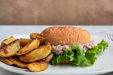ham salad  with seasoned potato wedges