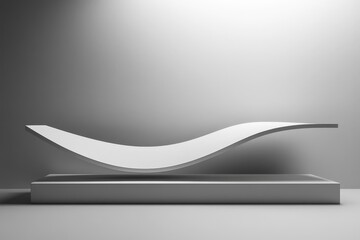 Abstract design of a sleek, white, curved object on a gray platform.