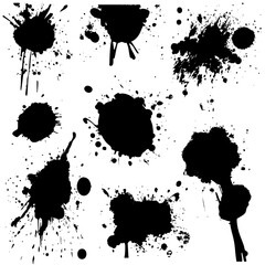 Black ink splashes on a white background create artistic abstract designs